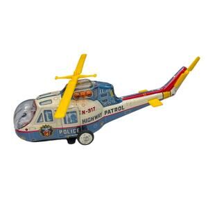Vintage tin Super Flying Police Helicopter in original box
